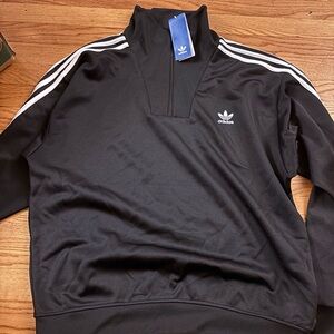 Adidas Black and White track jacket with Iconic Stripes